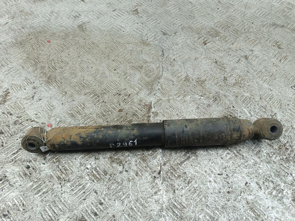 Амортизатор задний левый