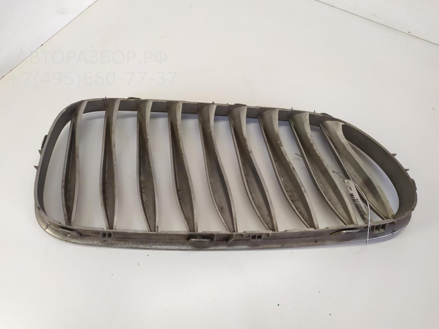 Решетка радиатора левая