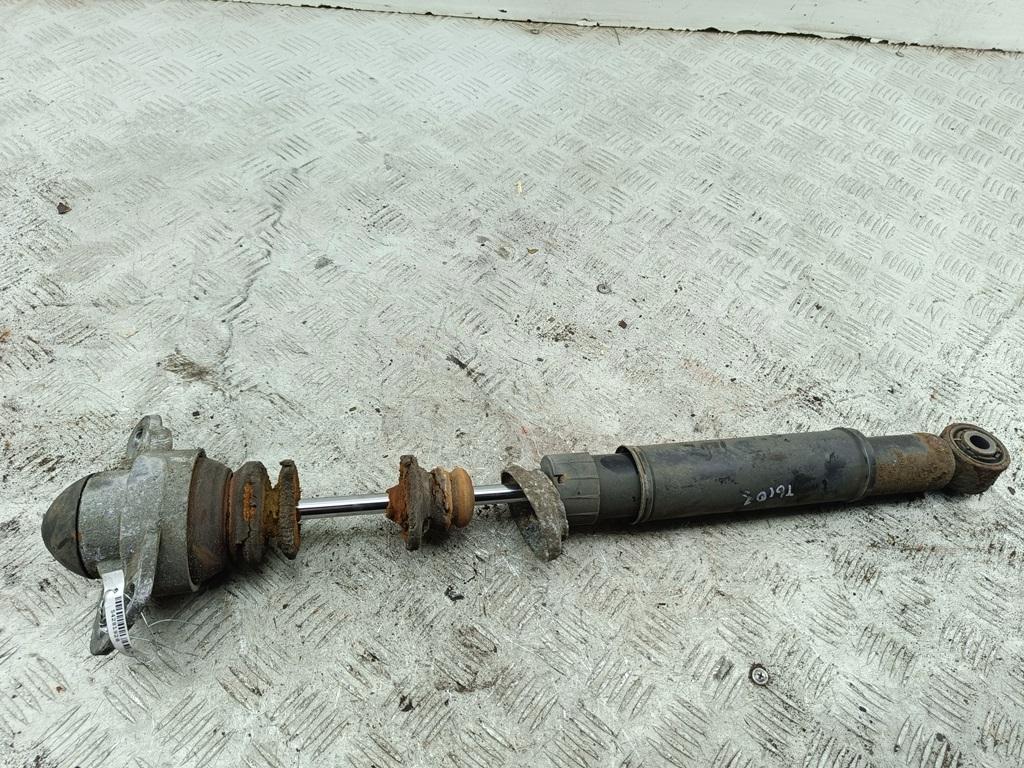 Амортизатор задний левый