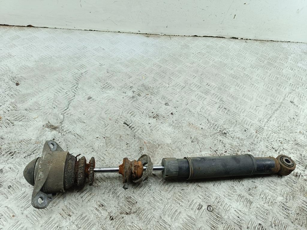 Амортизатор задний левый