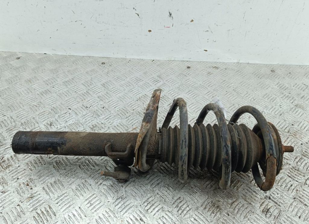 Амортизатор передний левый