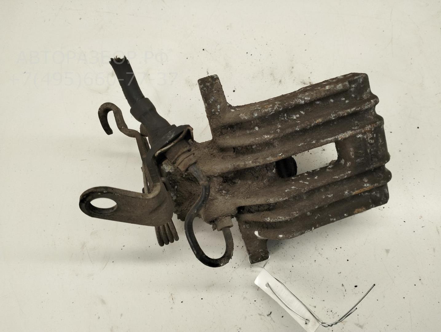 Суппорт задний левый