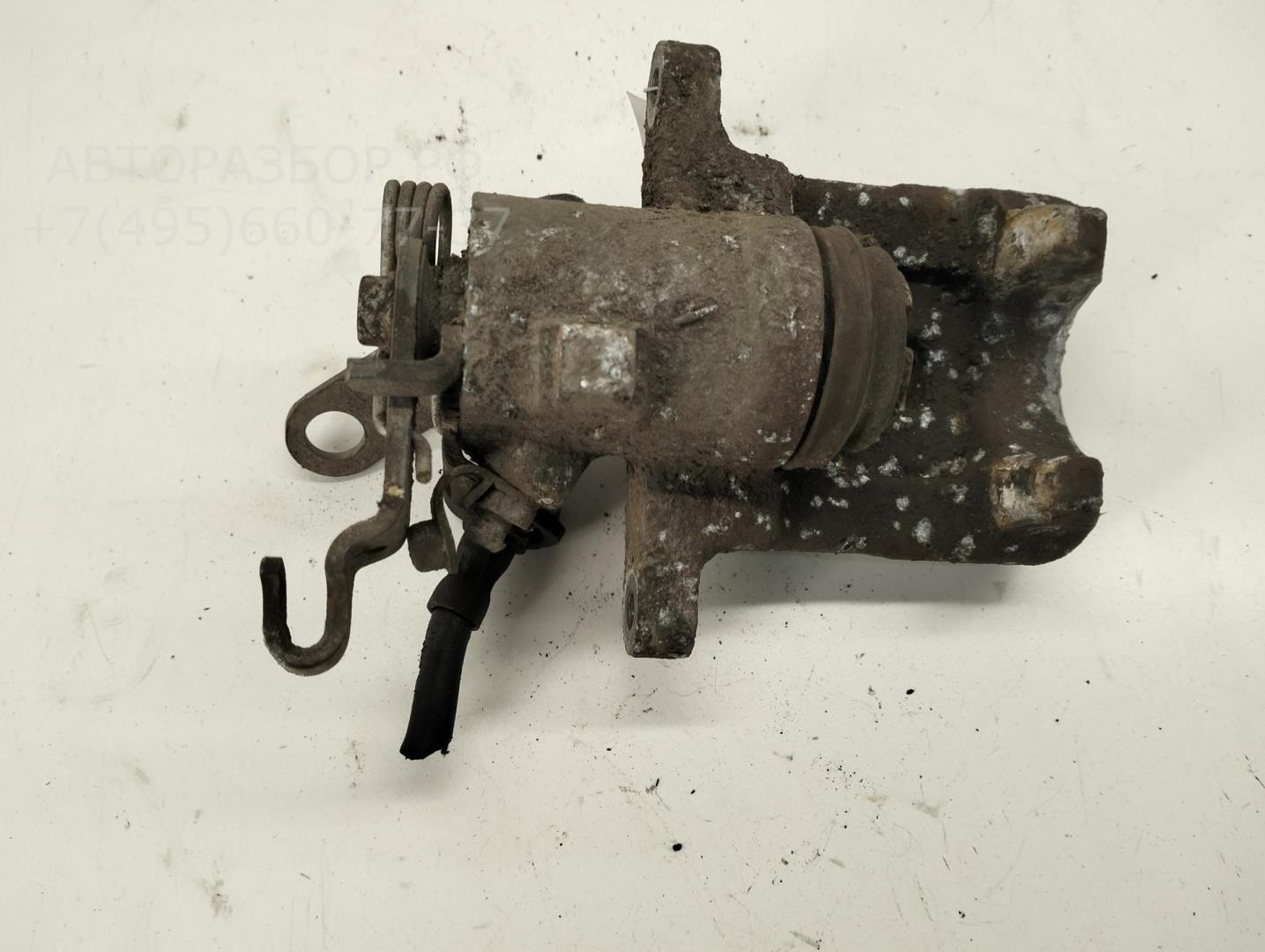 Суппорт задний левый