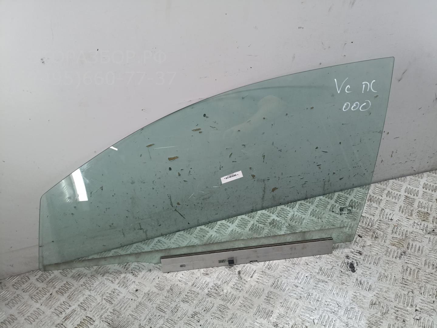 Стекло двери передней левой