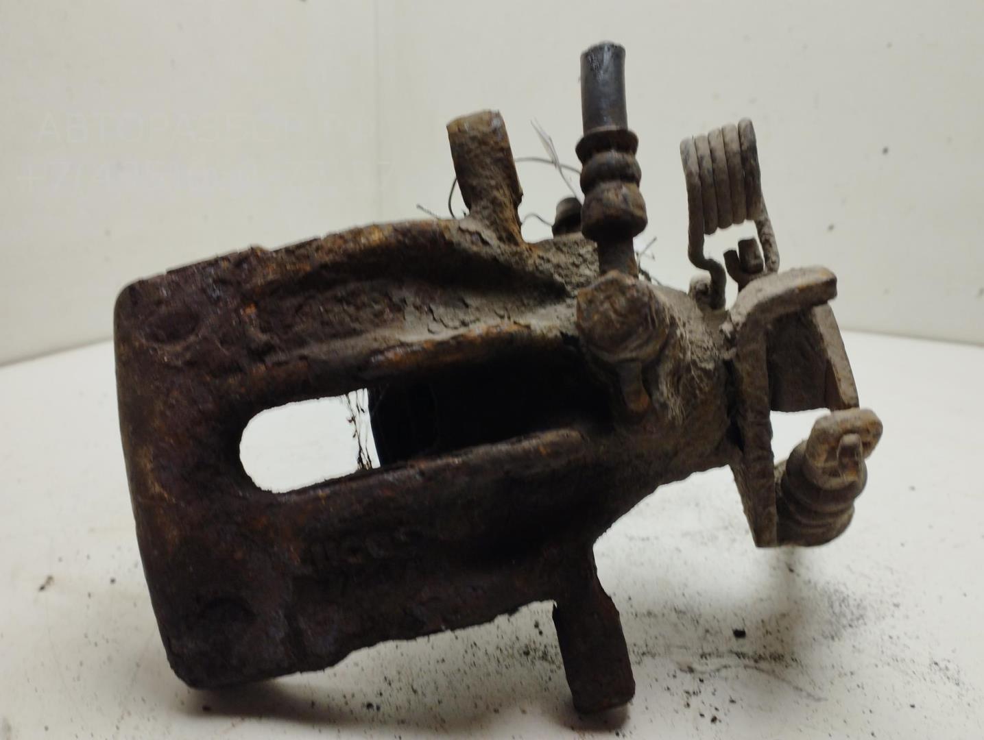 Суппорт задний левый