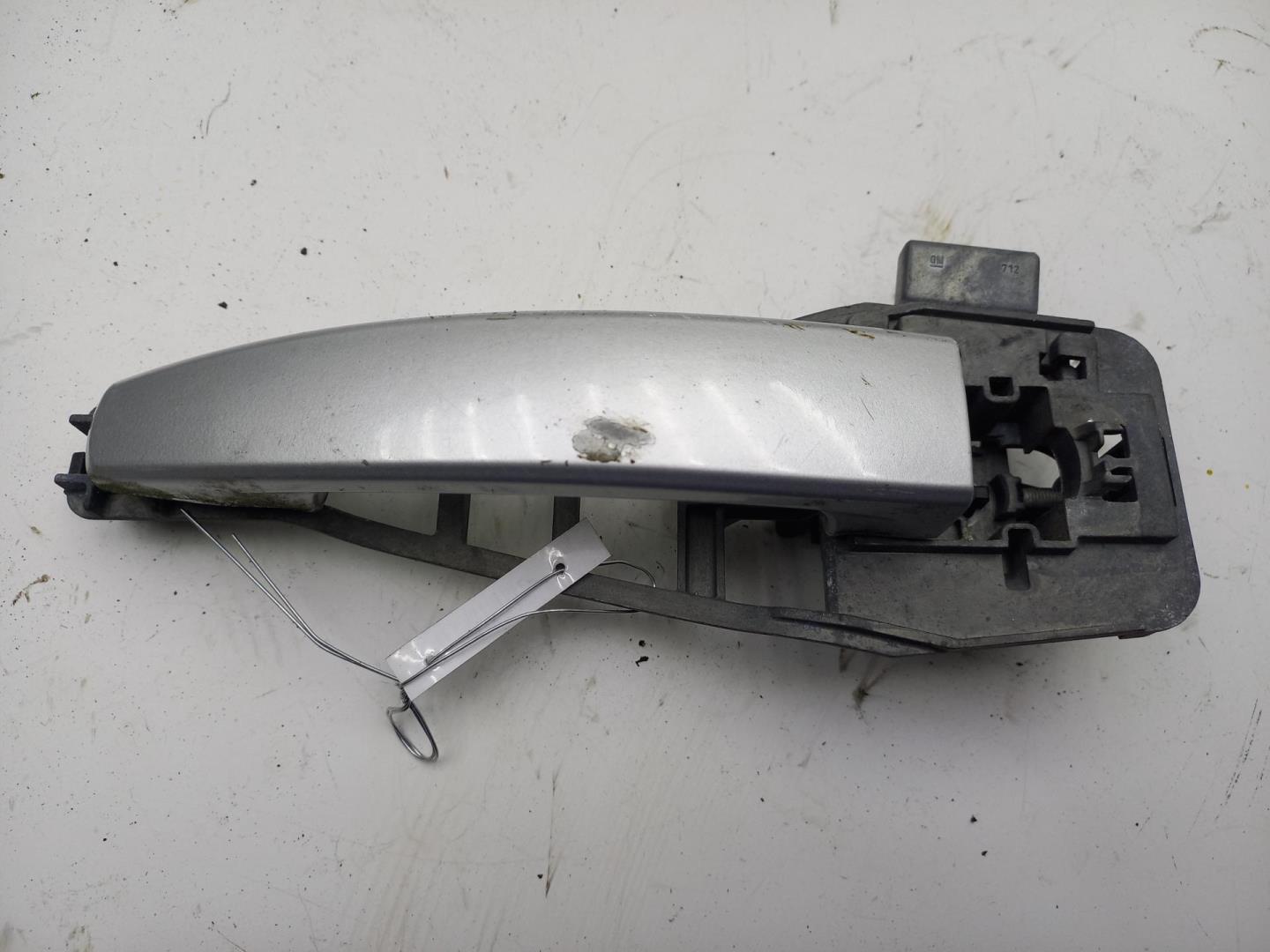 Ручка двери передней наружная левая