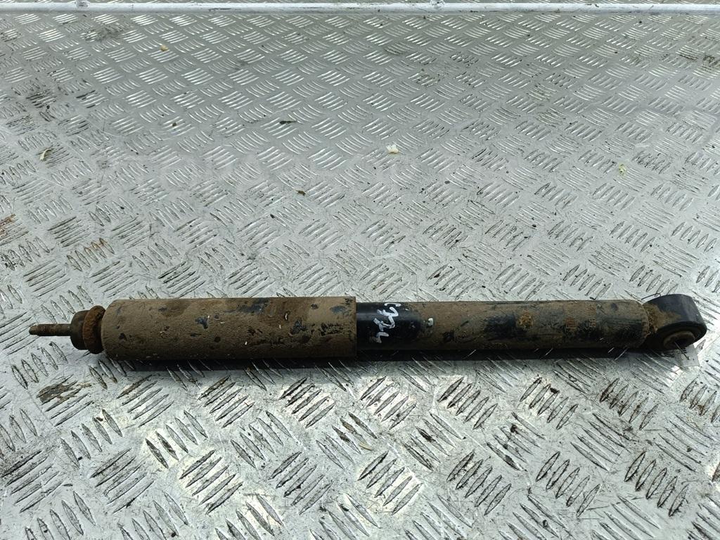 Амортизатор задний левый