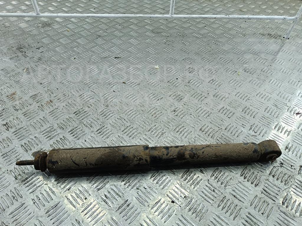 Амортизатор задний левый