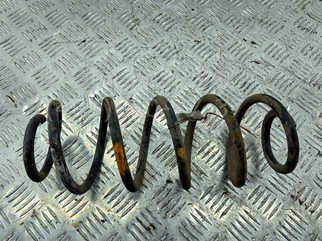 Пружина задняя