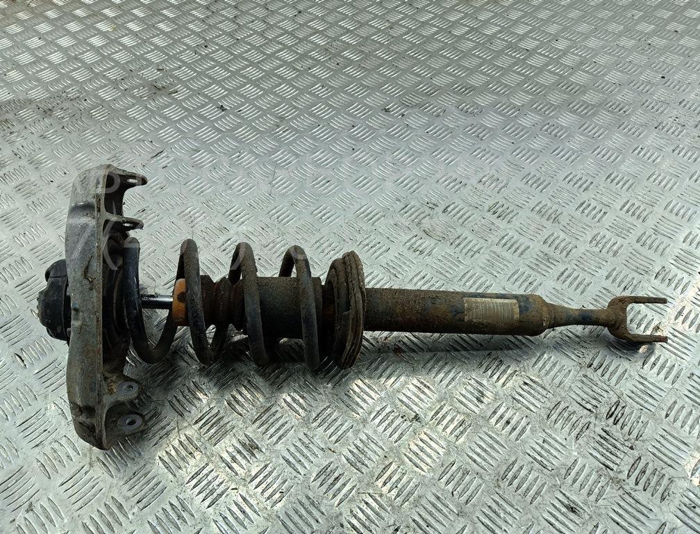 Амортизатор передний левый