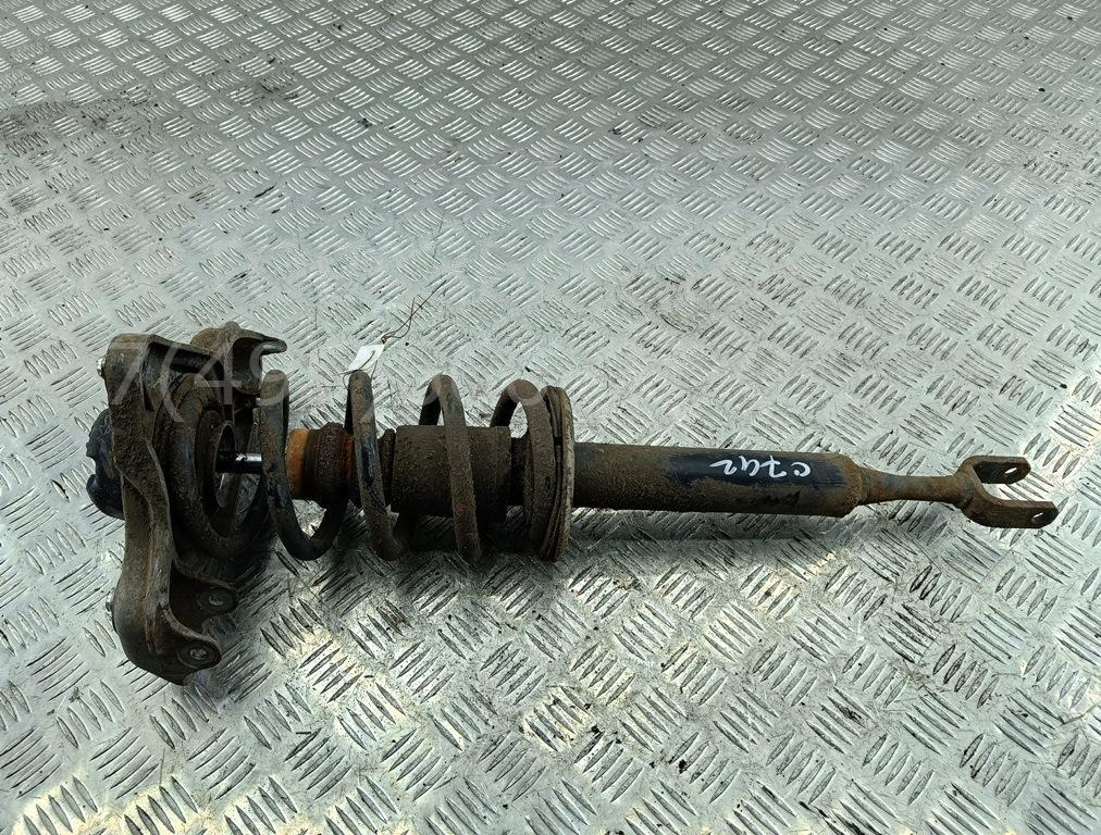 Амортизатор передний левый