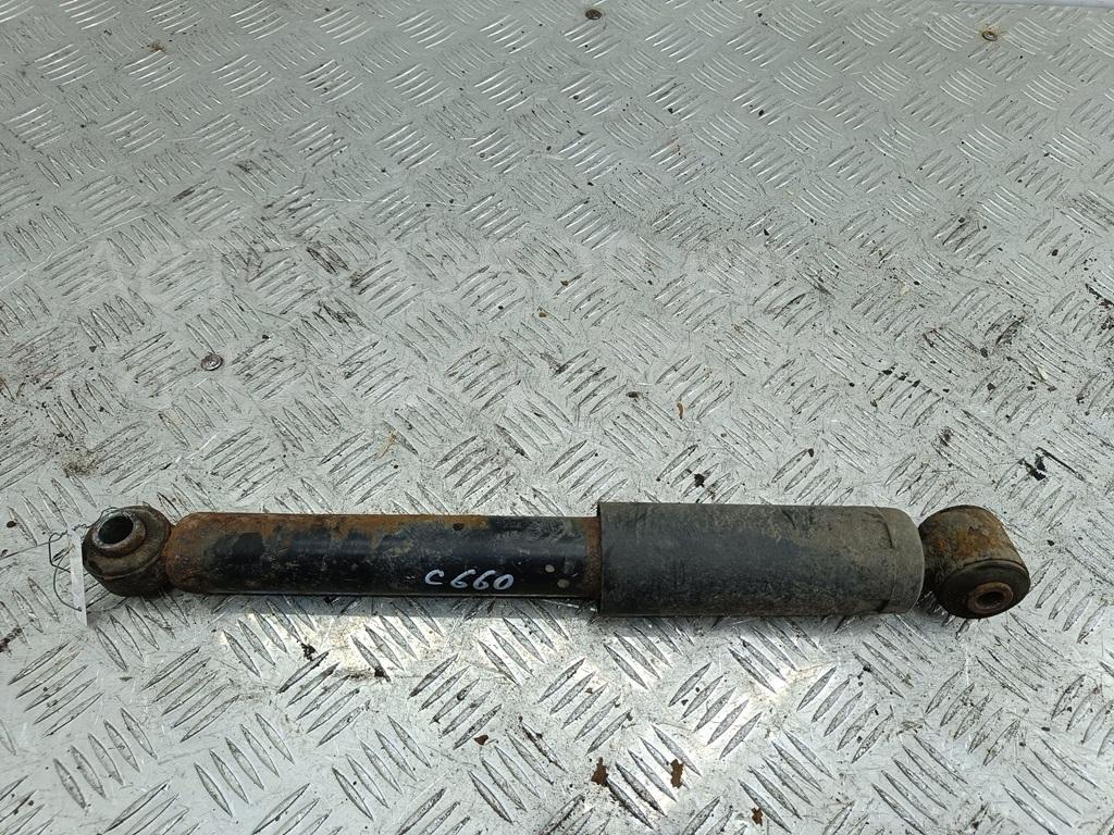 Амортизатор задний левый