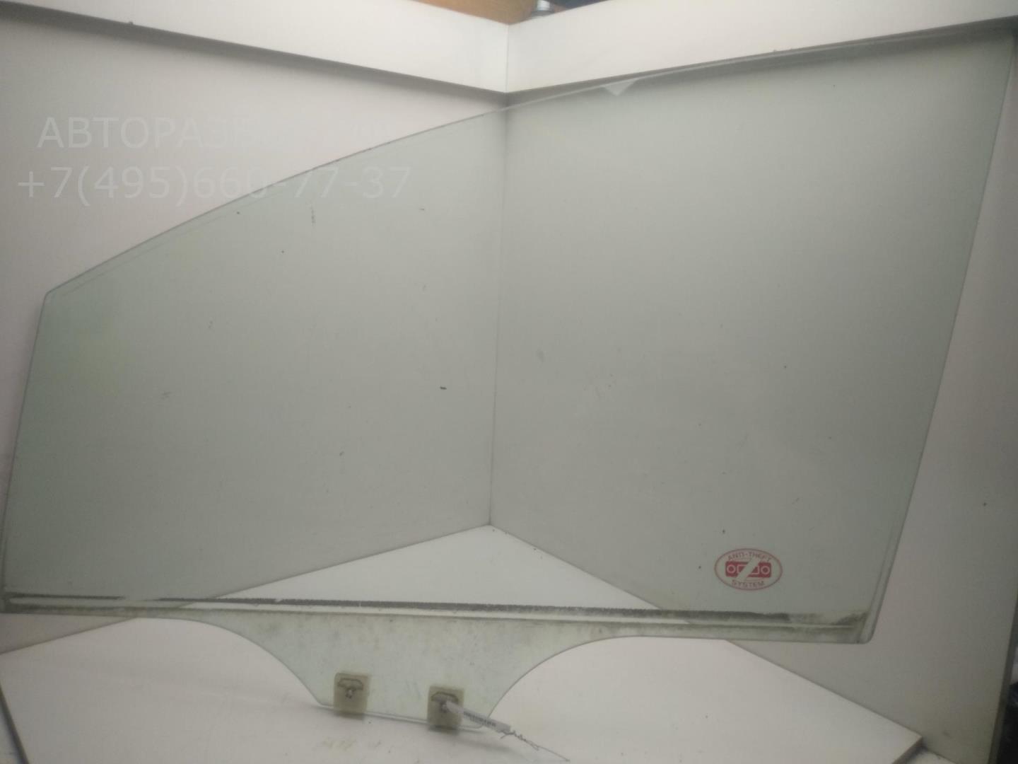 Стекло двери передней левой