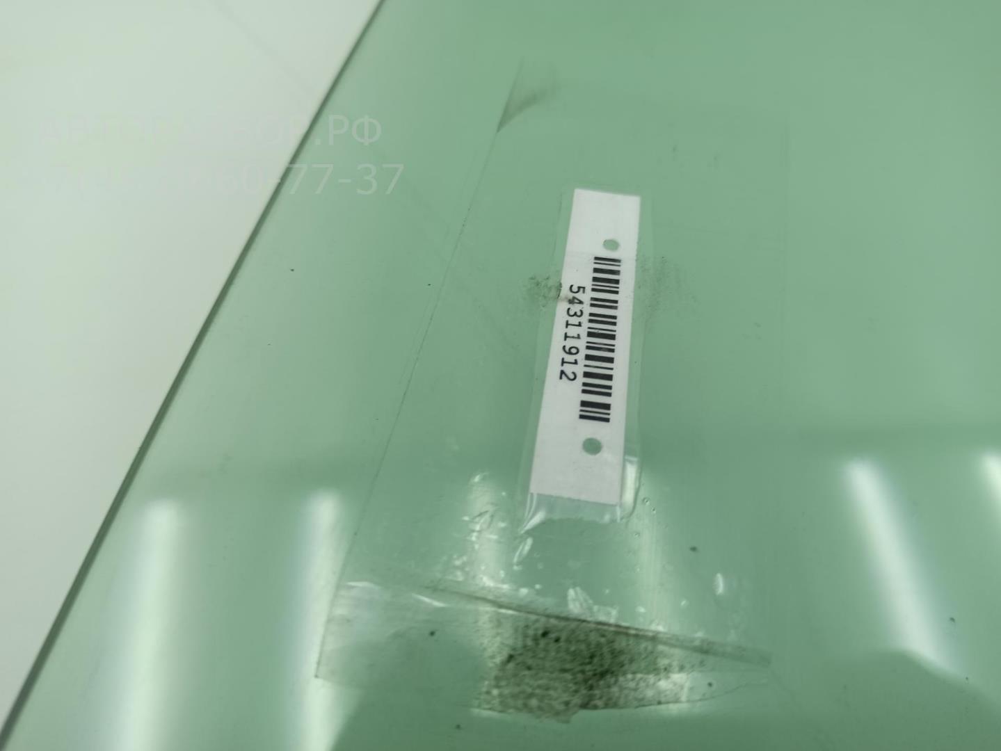 Стекло двери передней левой