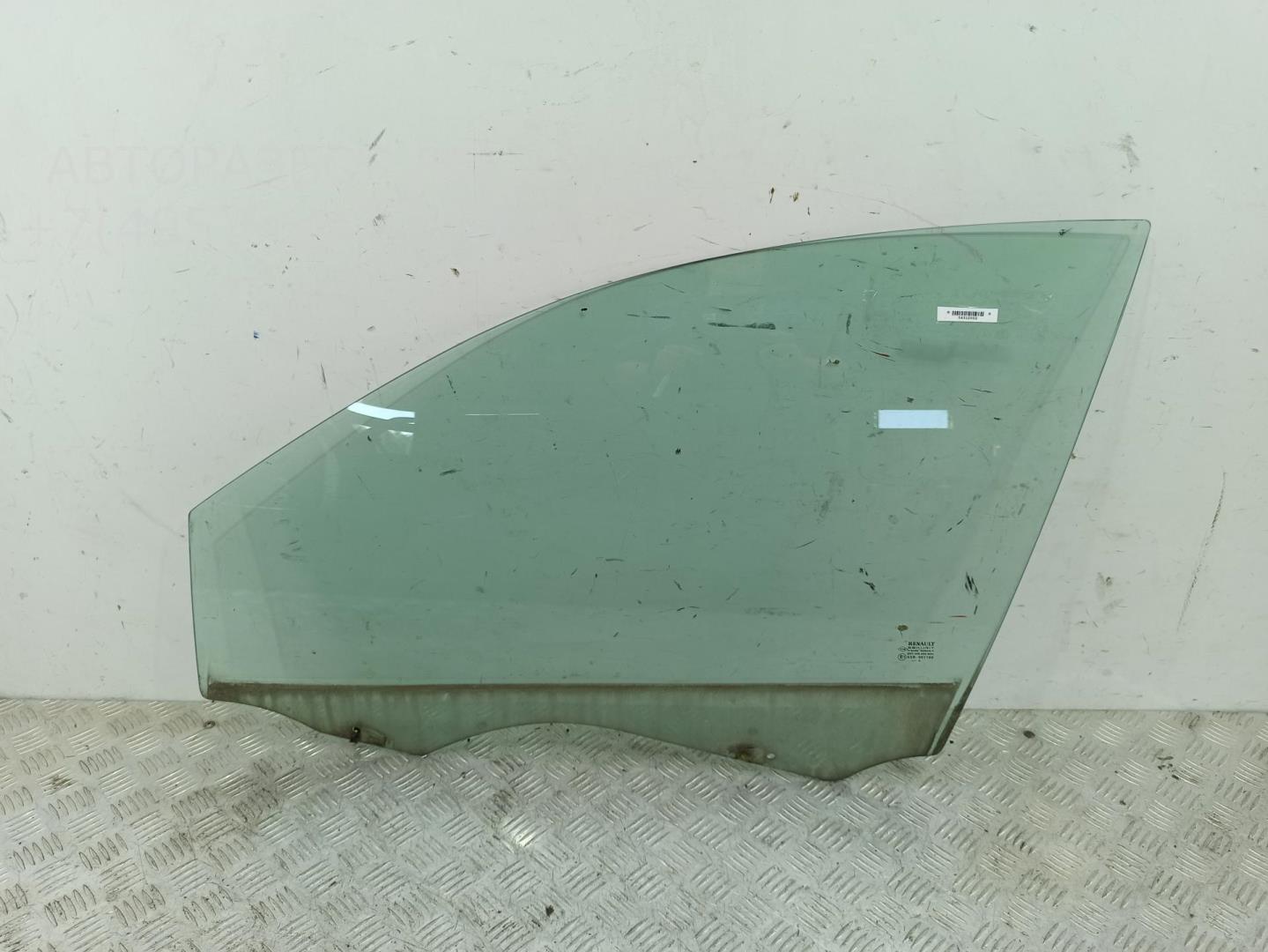 Стекло двери передней левой