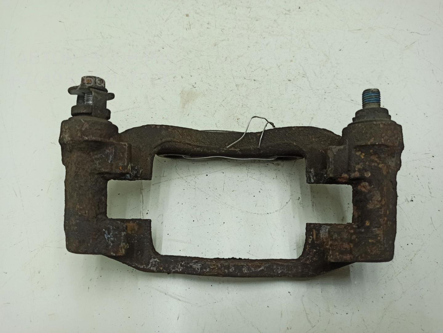 Скоба суппорта переднего