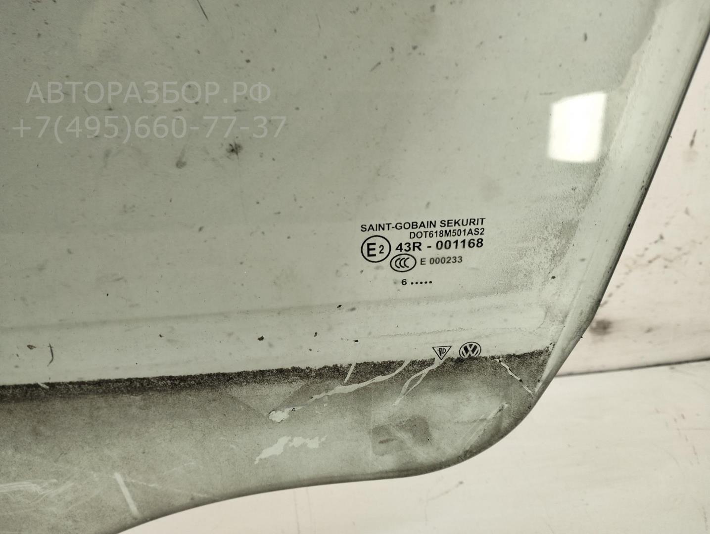 Стекло двери передней левой