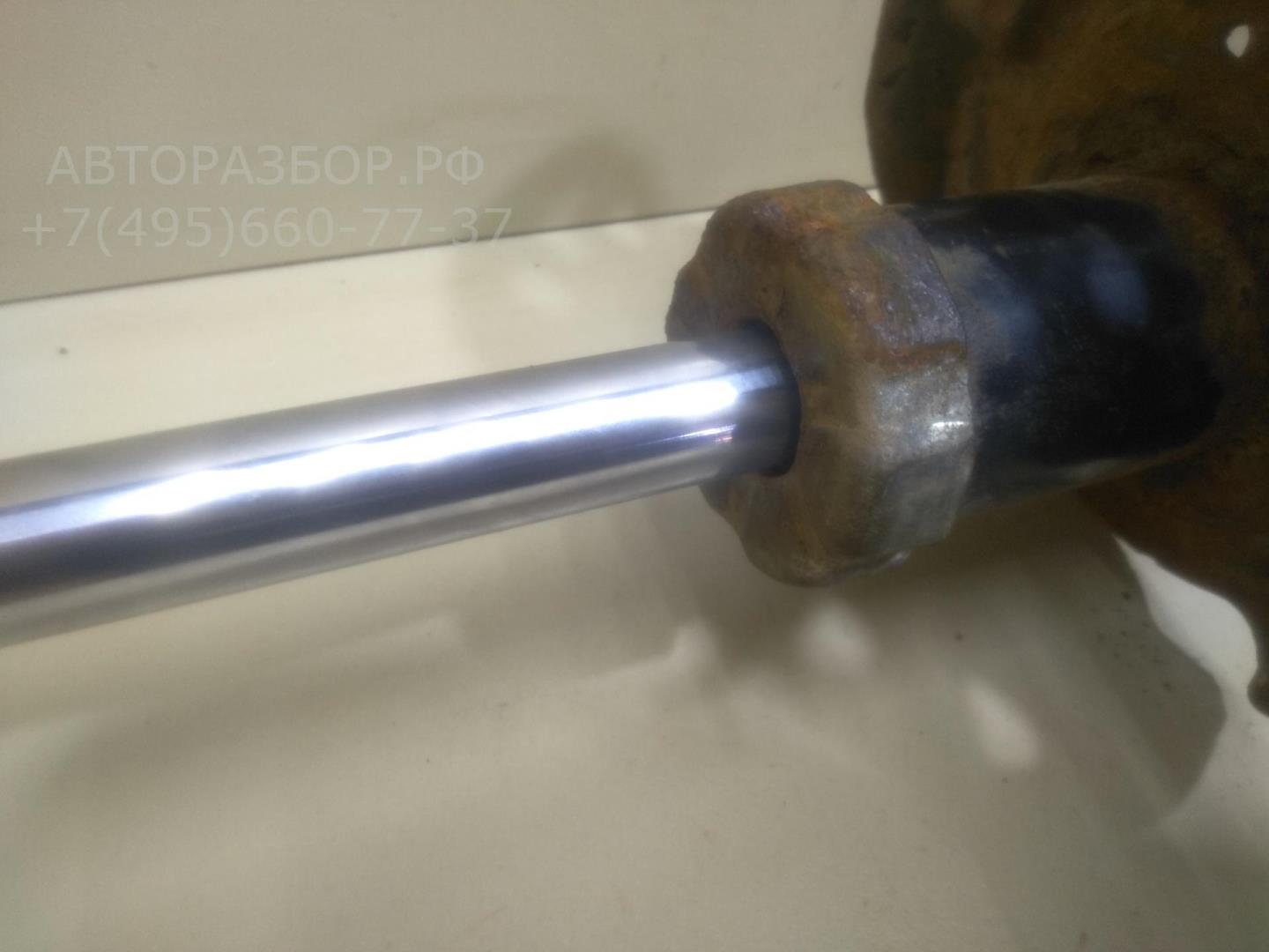 Амортизатор передний левый