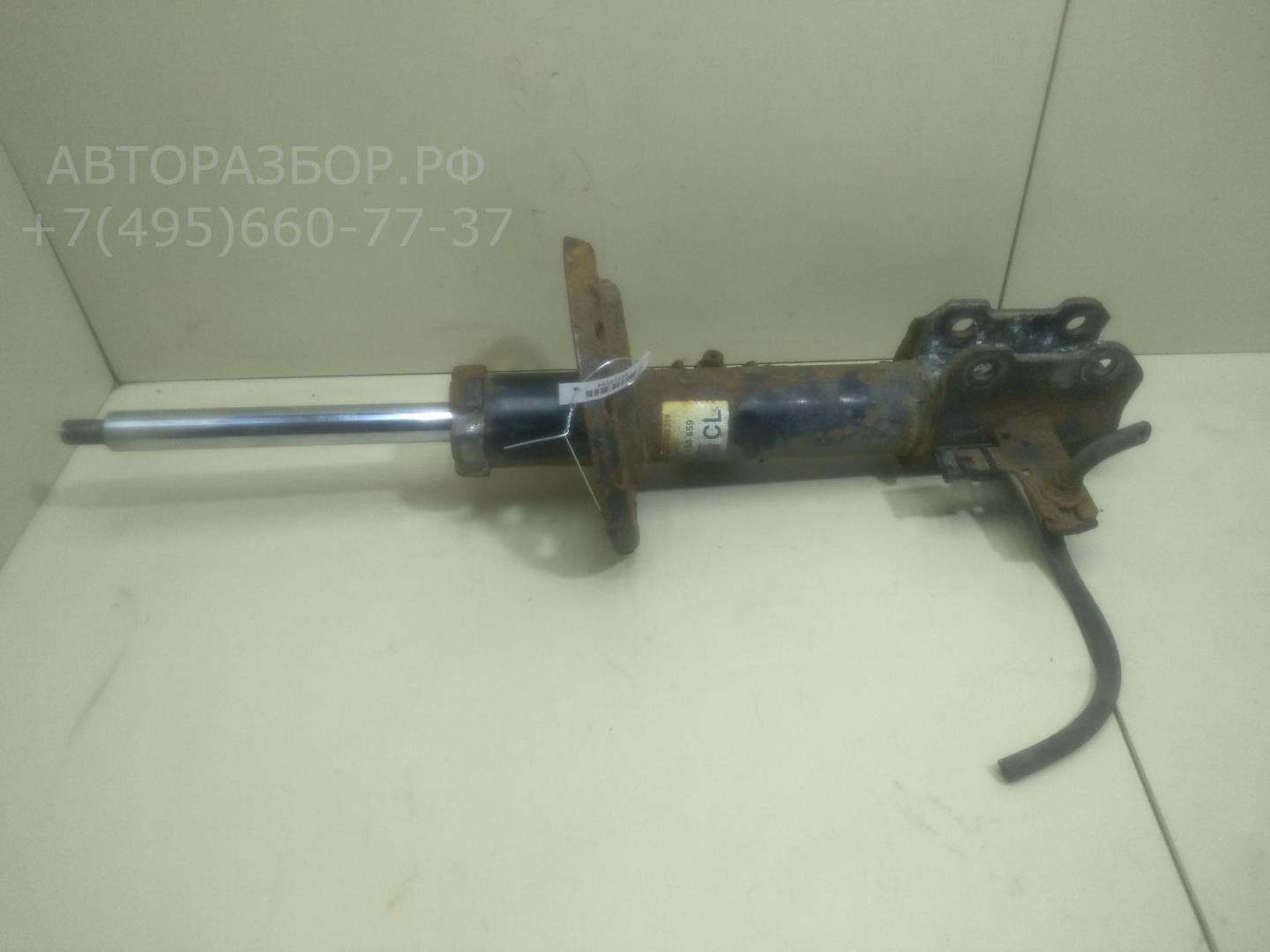 Амортизатор передний левый