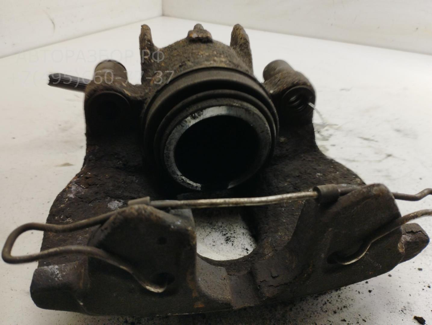 Суппорт передний левый