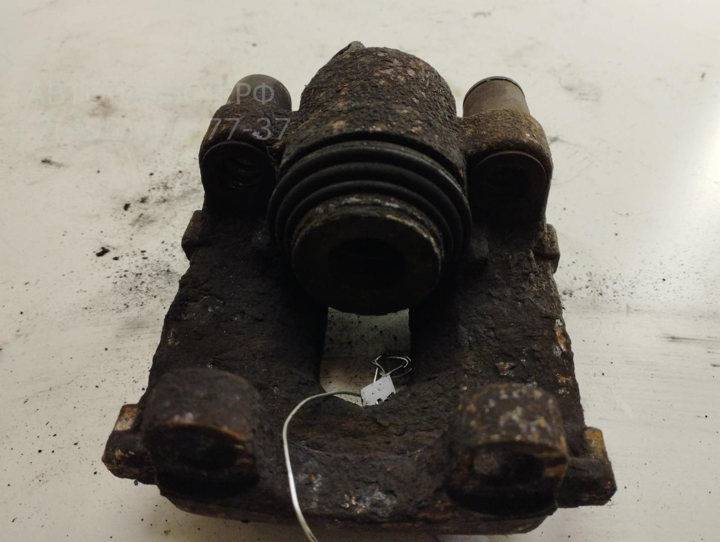 Суппорт задний левый