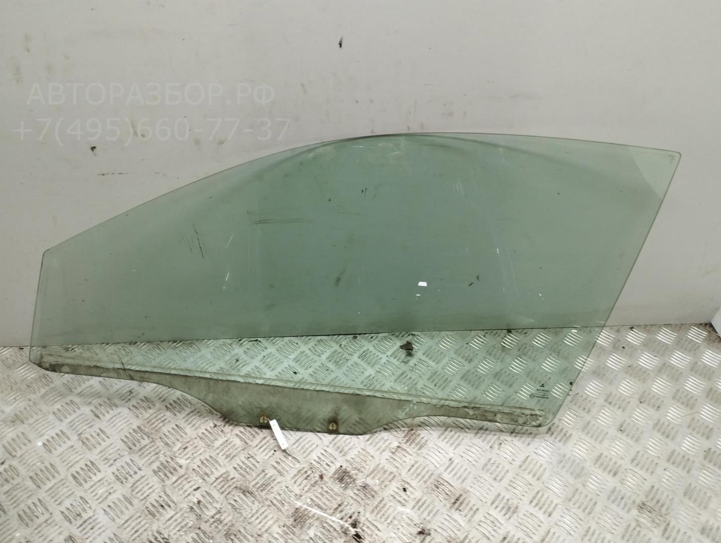Стекло двери передней левой