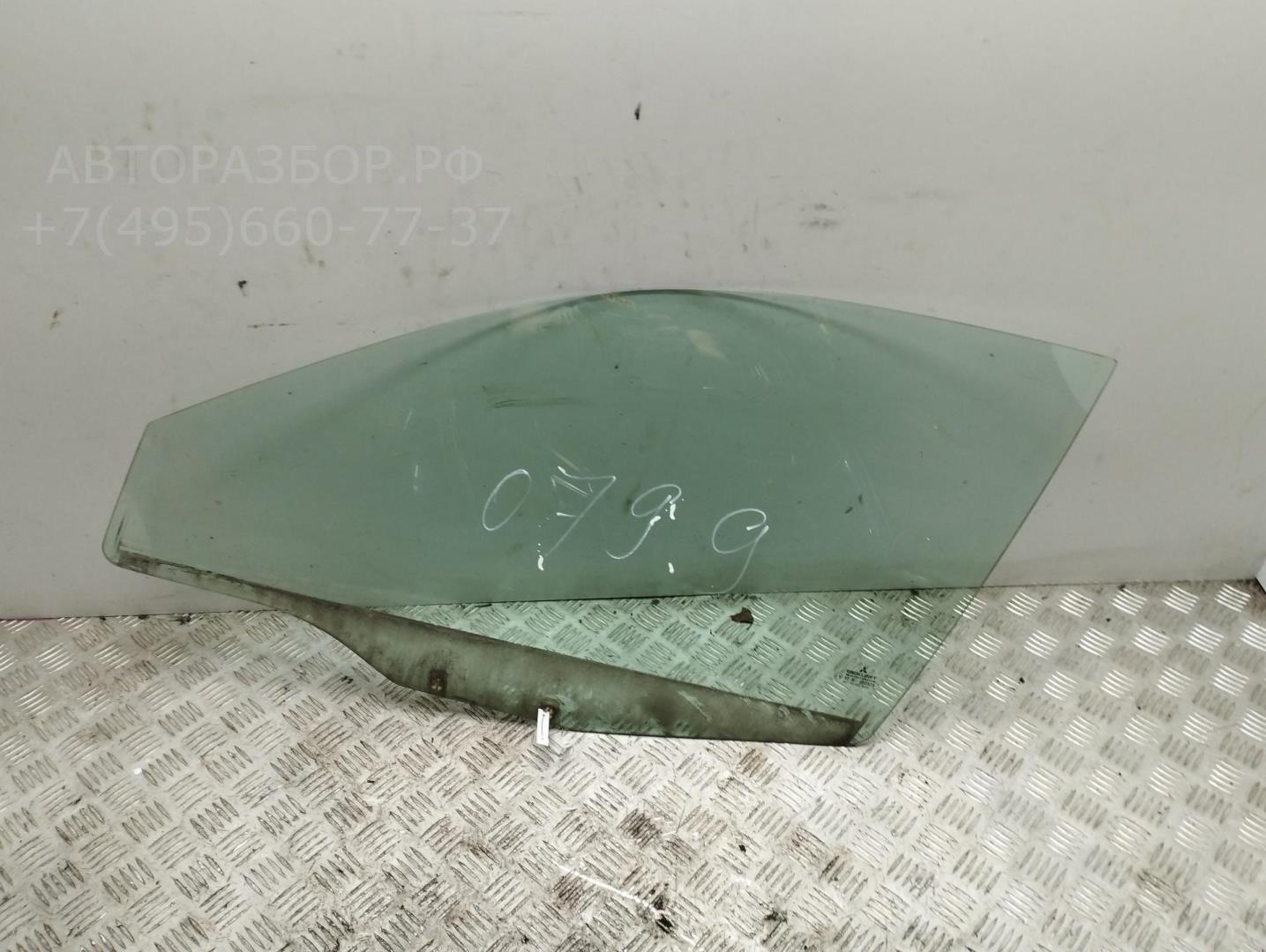 Стекло двери передней левой