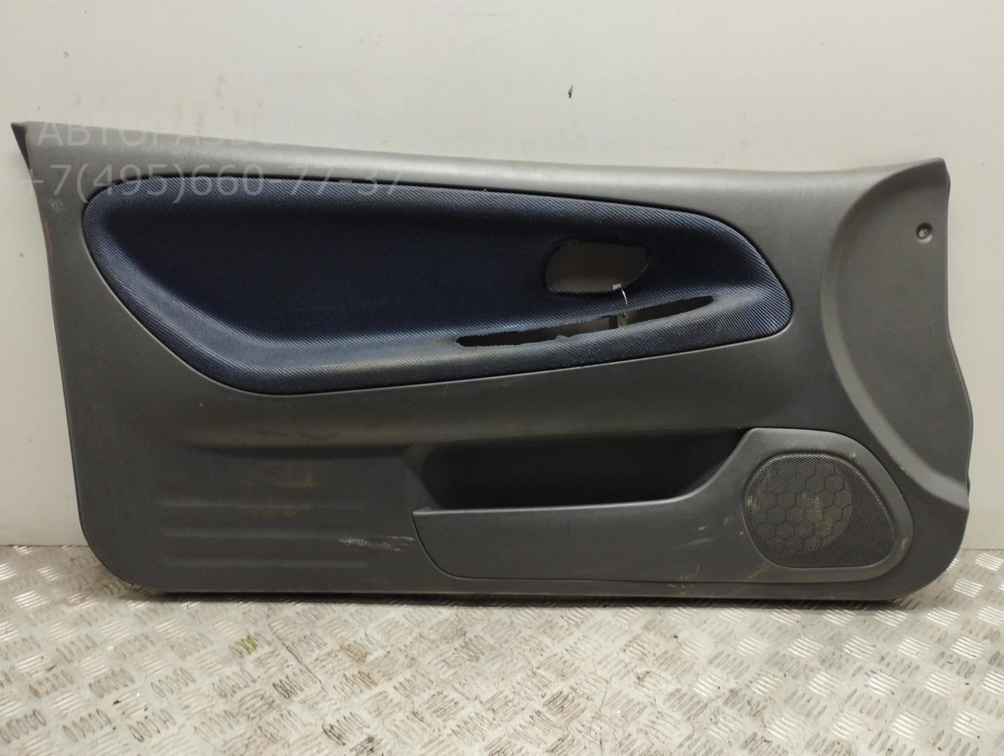 Обшивка двери передней левой