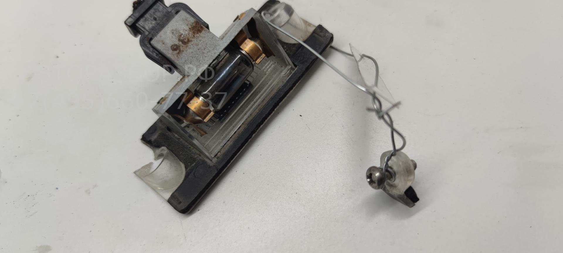 Фонарь подсветки номера