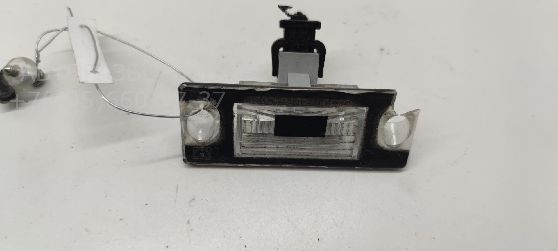 Фонарь подсветки номера