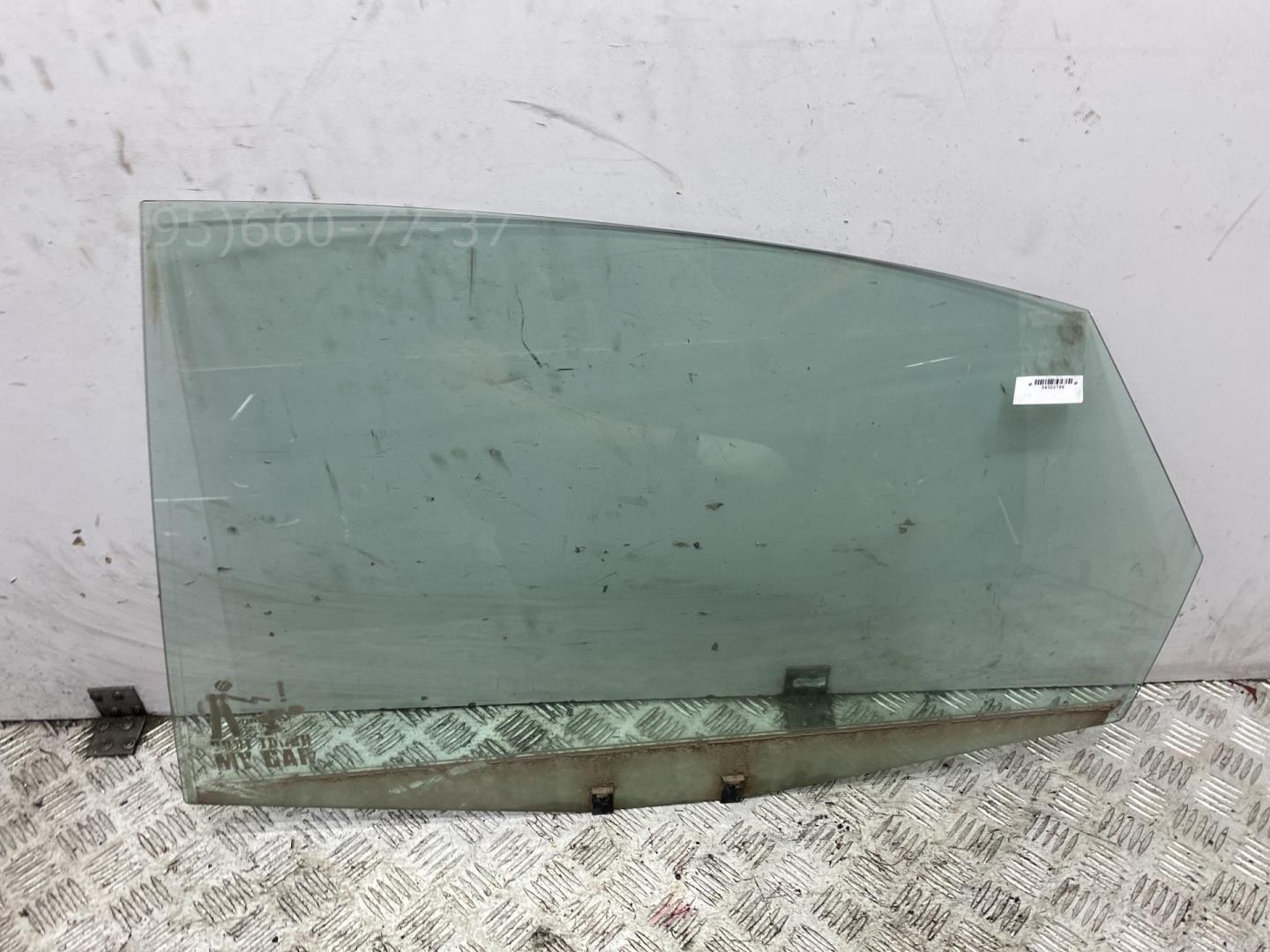 Стекло двери задней левой