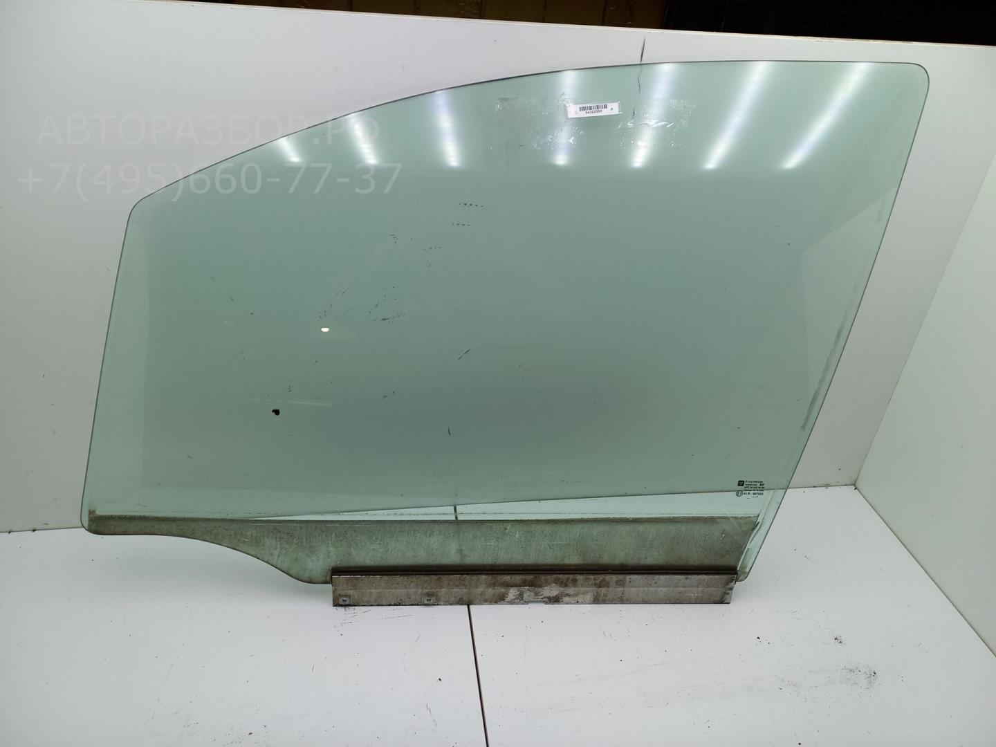 Стекло двери передней левой