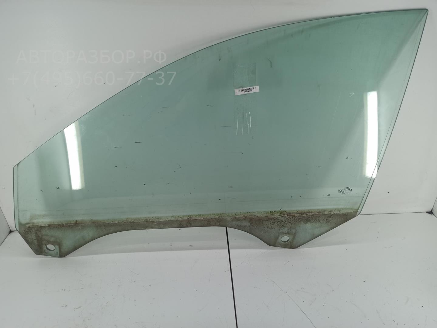 Стекло двери передней левой