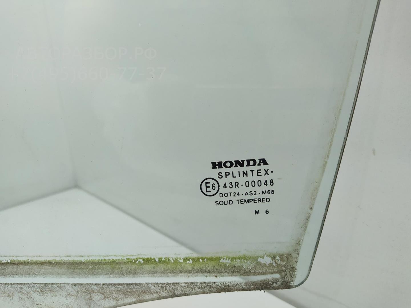 Стекло двери задней левой