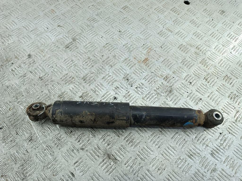 Амортизатор задний левый