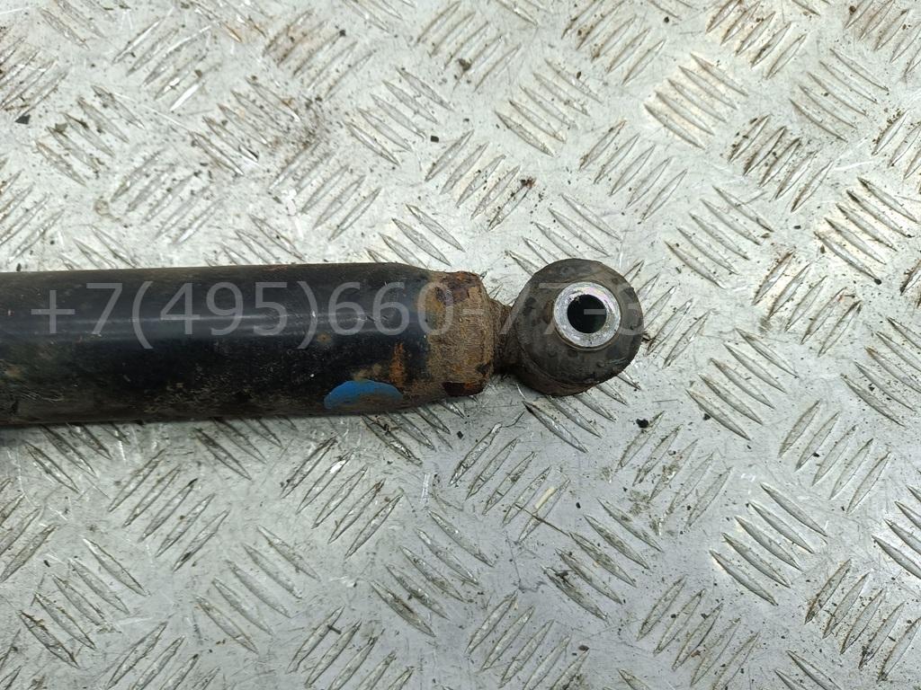 Амортизатор задний левый