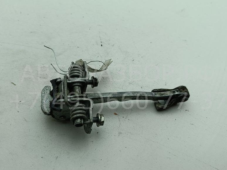 Ограничитель двери