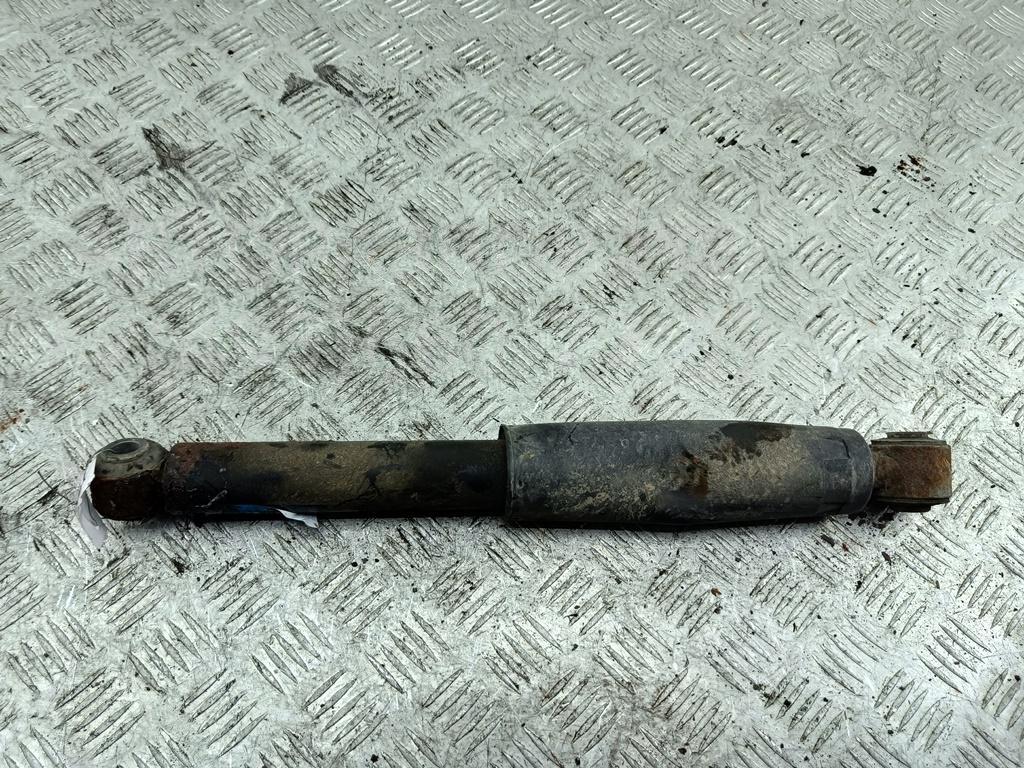 Амортизатор задний левый