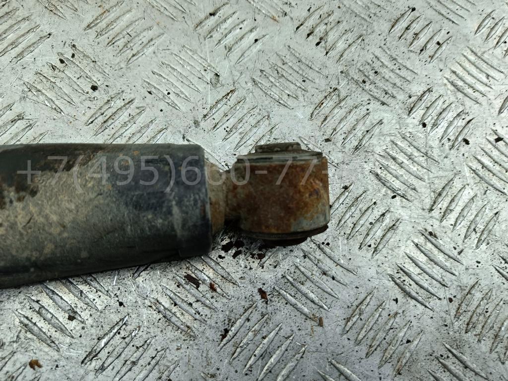 Амортизатор задний левый