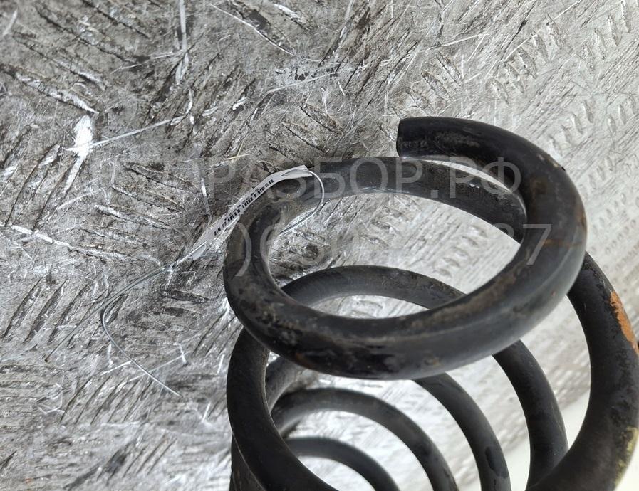 Пружина задняя