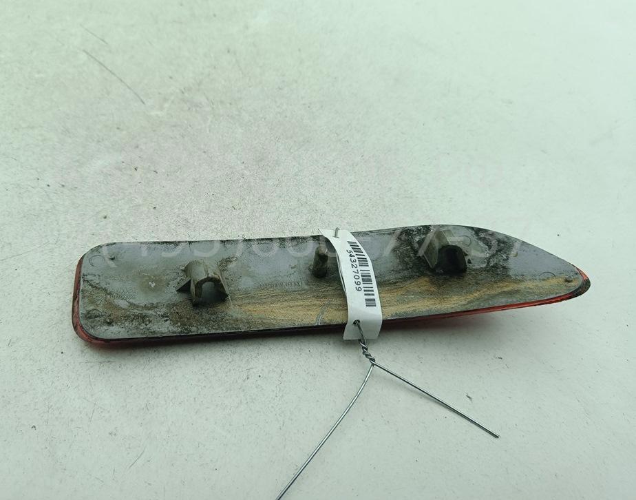 Отражатель в бампер задний левый