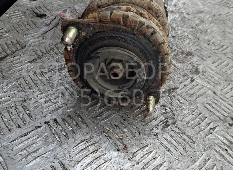 Амортизатор задний левый