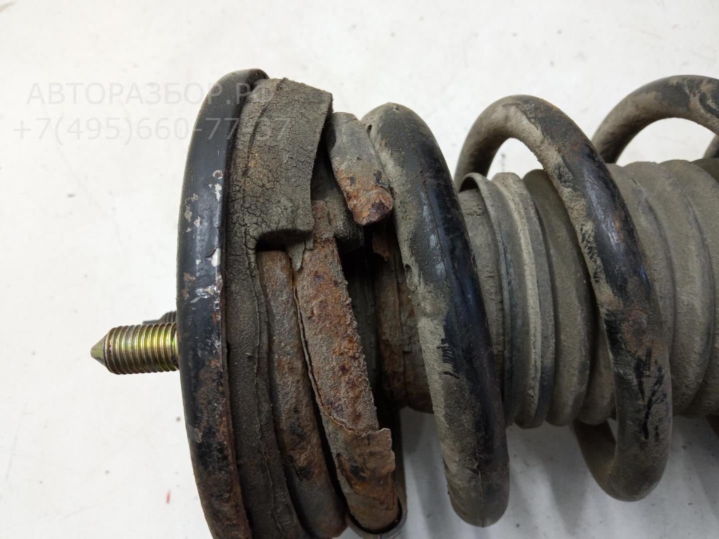 Амортизатор задний левый