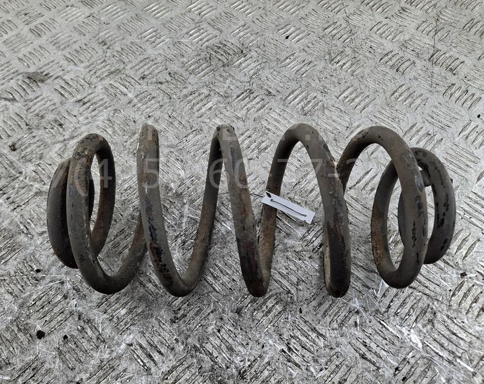 Пружина задняя