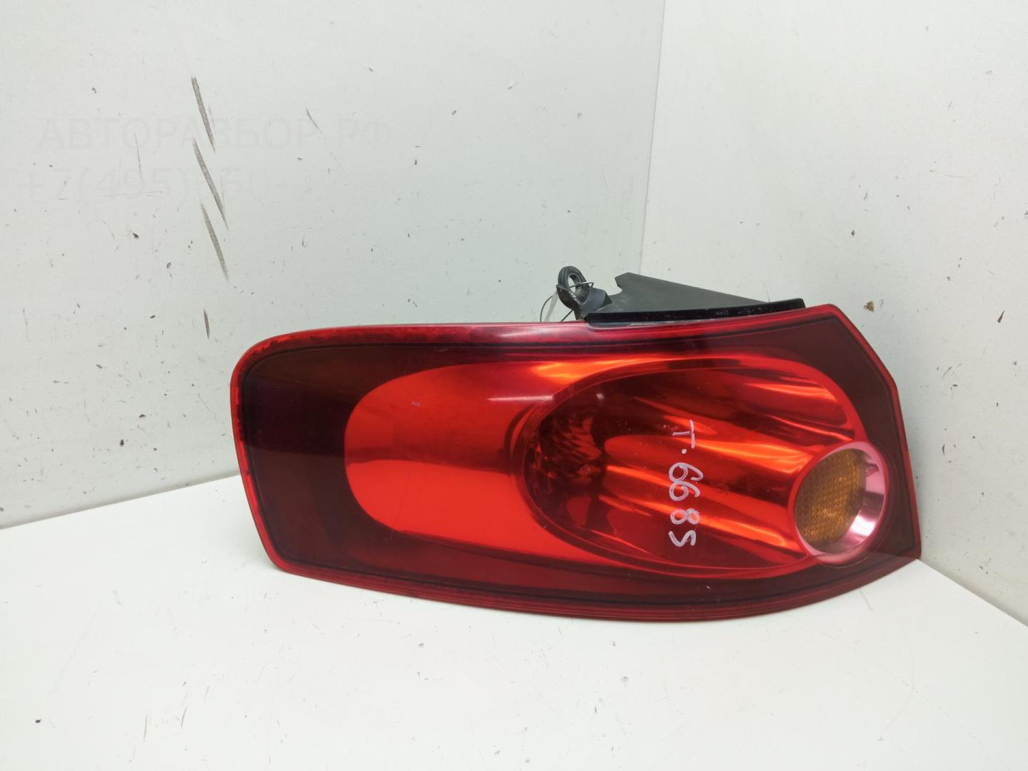 Фонарь задний левый