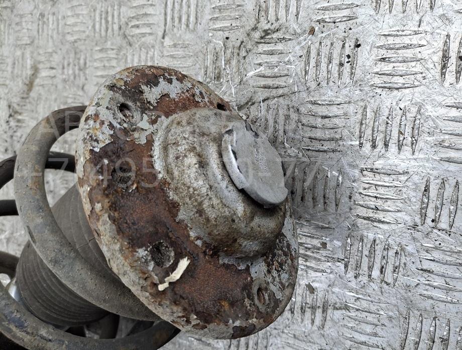 Амортизатор передний левый