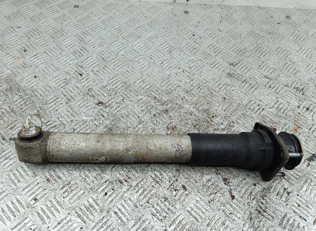 Амортизатор задний левый