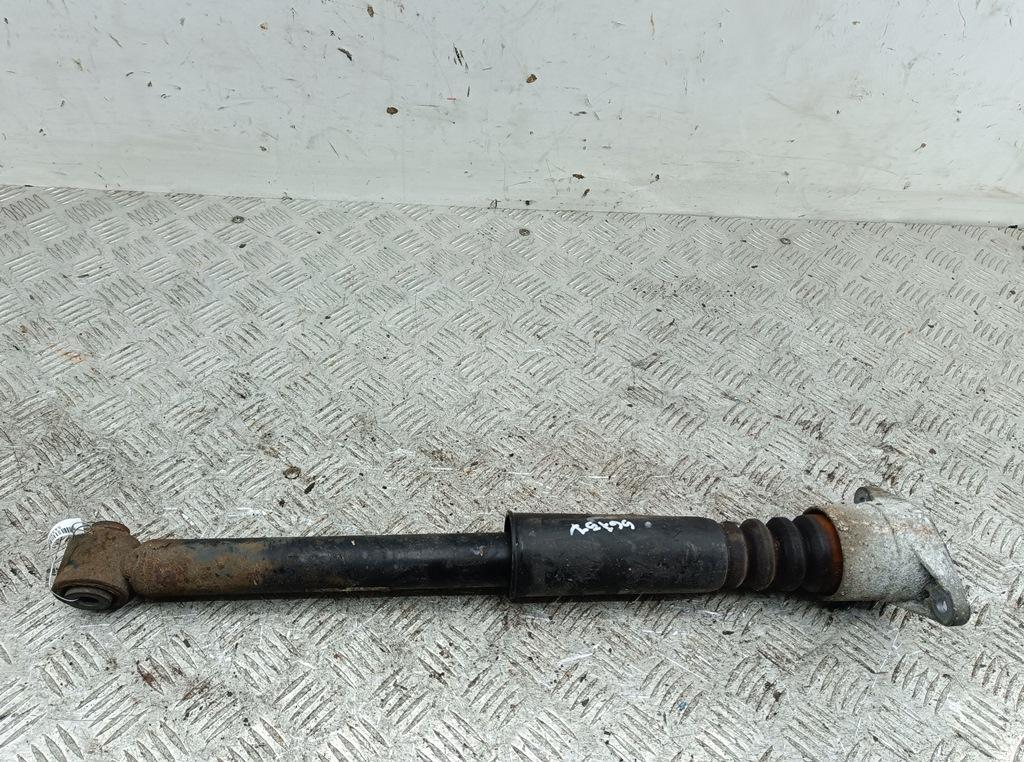 Амортизатор задний левый