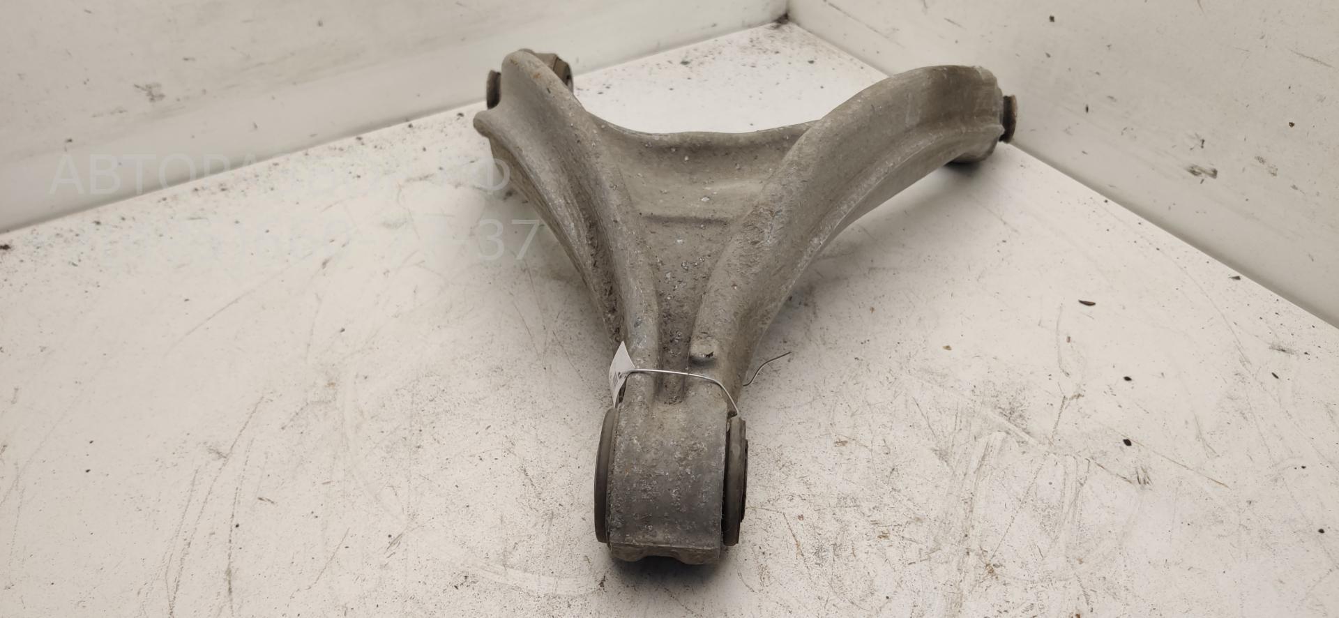 Рычаг задний левый