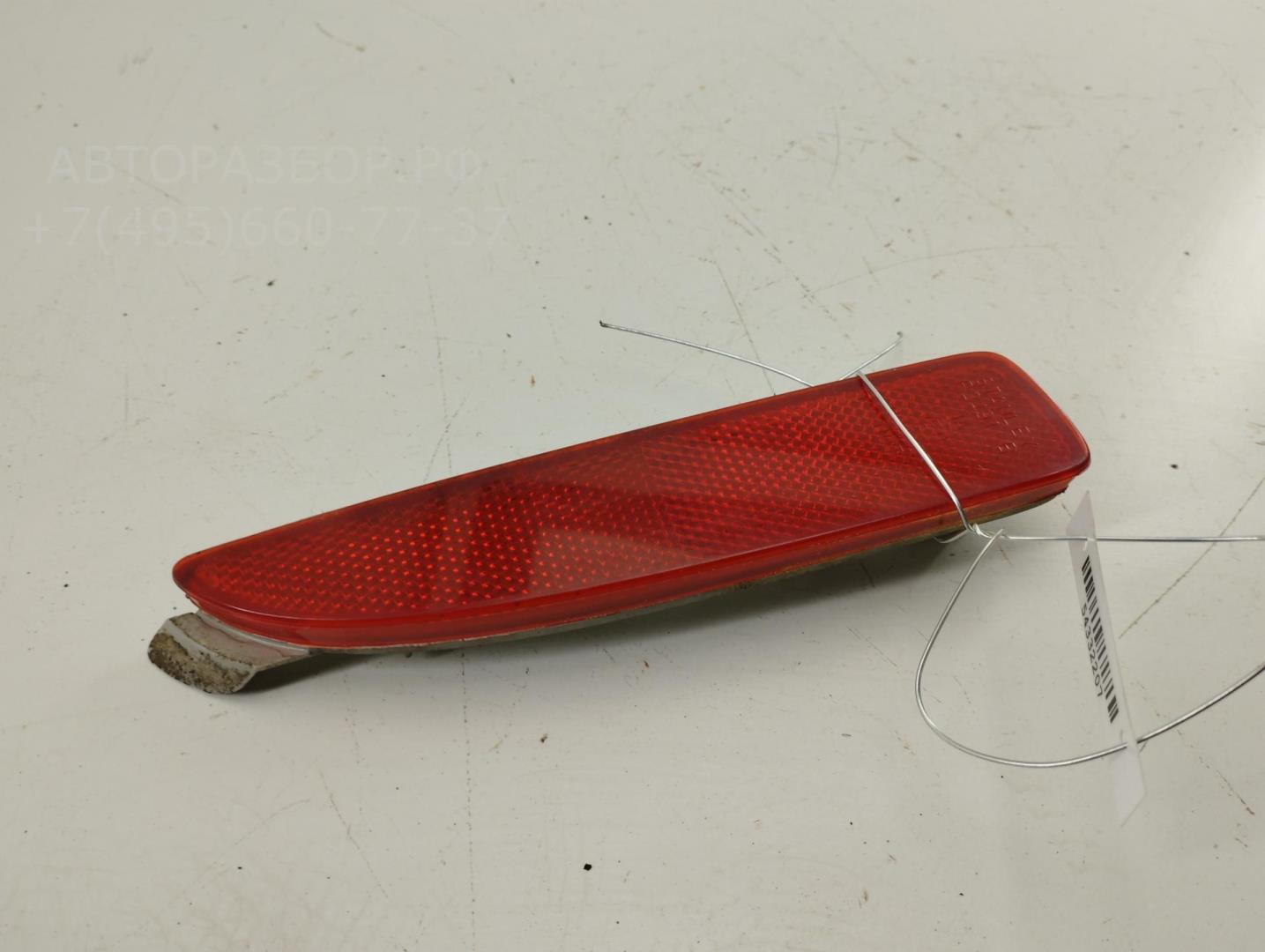 Отражатель в бампер задний левый